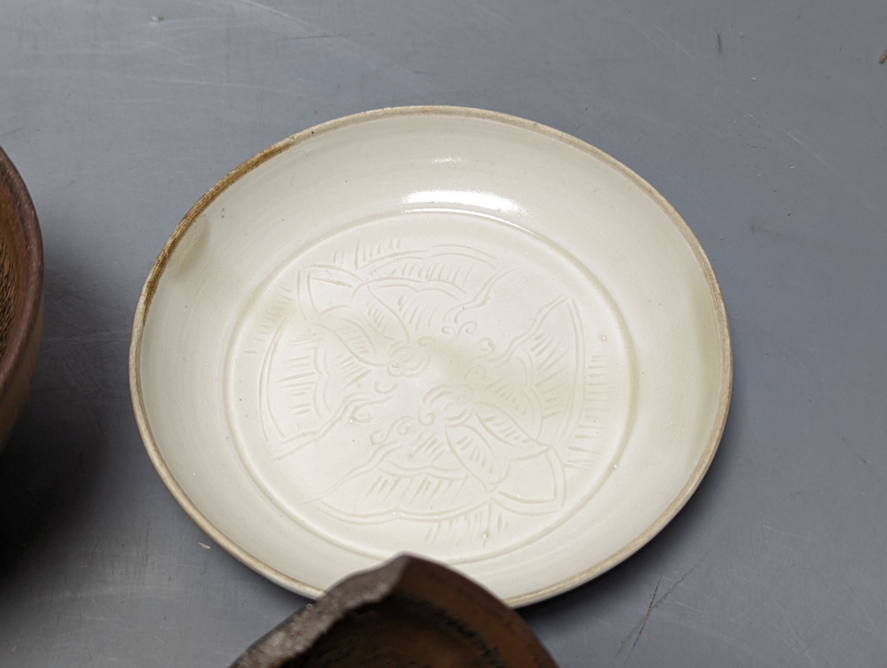 Two Chinese hare’s fur bowls and a Qingbai style dish, 13cm